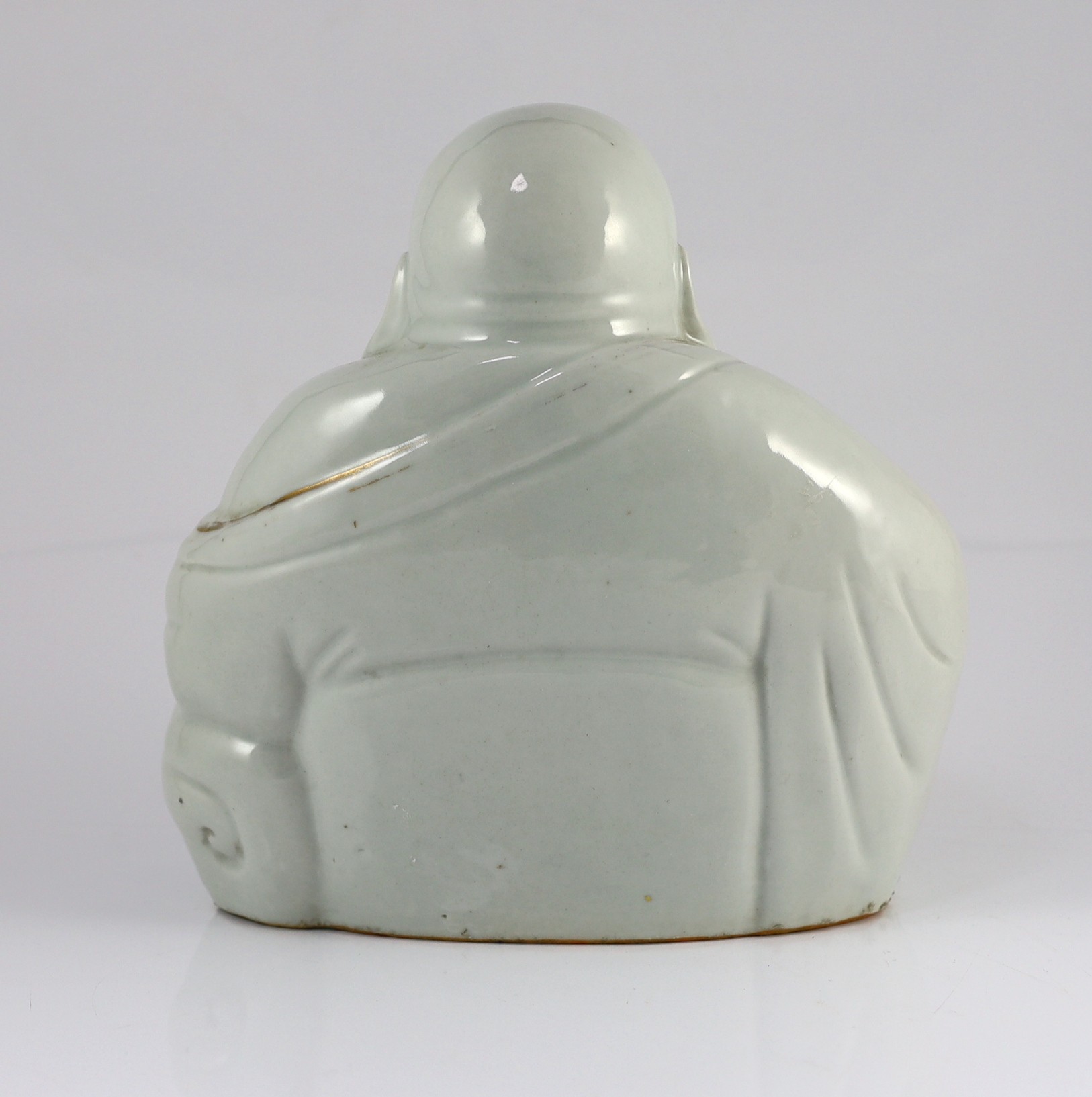 A Chinese porcelain figure of Budai, Republic period, 25cm high, wear to gilding